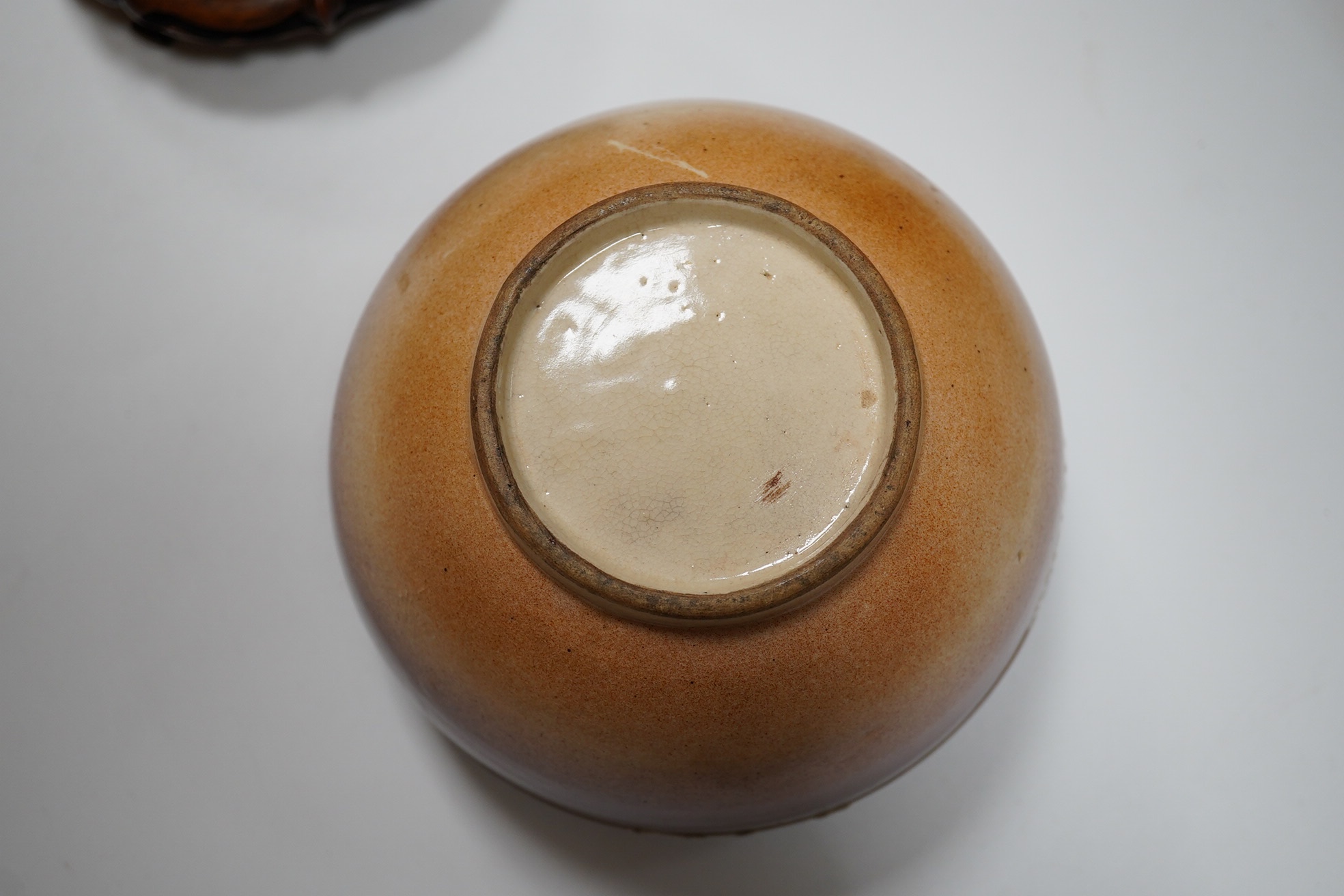 A Japanese Satsuma pottery box and cover on stand, box and cover 14.5cm diameter. Condition - crack to bowl of box and some scratches to surface glazing